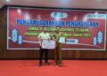 Achmad Zaenuri, seorang arsiparis yang mewakili Dispusip PPU meraih juara kedua dalam Anugerah Arsiparis Teladan 2024. (Foto : istimewa)