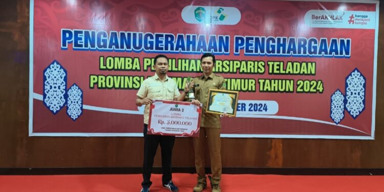 Achmad Zaenuri, seorang arsiparis yang mewakili Dispusip PPU meraih juara kedua dalam Anugerah Arsiparis Teladan 2024. (Foto : istimewa)