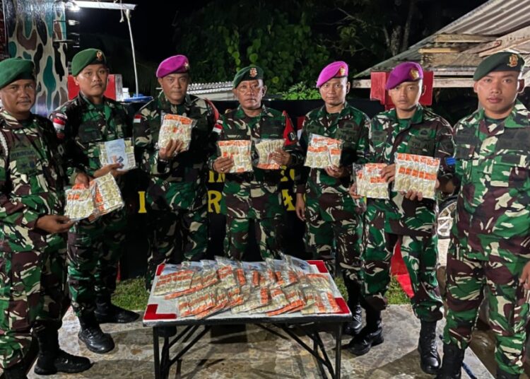 Satgas Pamtas Yonarmed 11 Kostrad Gagalkan Penyelundupan 960 Kosmetik Ilegal di Dermaga Bambangan