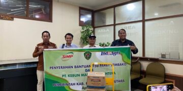 Serah terima bantuan 150 paket sembako dari PT Kebun Mandiri Sejahtera (KMS)